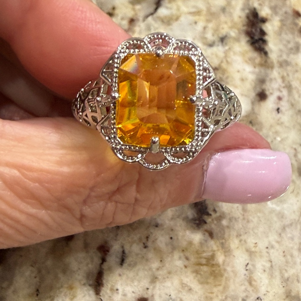 Elegant Silver Ring with Yellow Gemstone